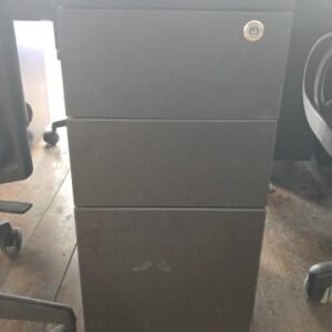 Black metal mobile office drawer unit featuring three drawers and a central lock.